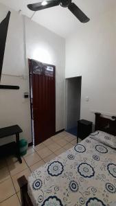 Postel nebo postele na pokoji v ubytování Posada San Carlos