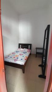 Postel nebo postele na pokoji v ubytování Posada San Carlos