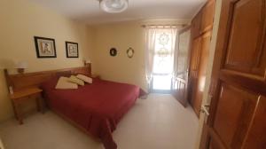 Postel nebo postele na pokoji v ubytování Salinas Cancajos + 29 fotografií