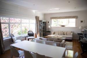 a living room with a couch and a table at Apartment 88 in Greytown