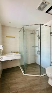 Koupelna v ubytování Huy Hoàng Hotel + 37 fotografií