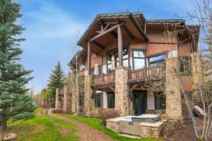 a large house with a balcony on top of it at 5 Bedroom Luxury Townhome In Lionshead Village in Vail