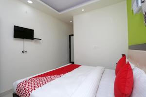 Katil atau katil-katil dalam bilik di Hotel O Raj Palace
