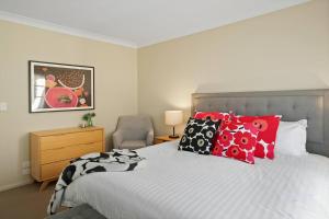 Postel nebo postele na pokoji v ubytování Magnolia Cottage - Your private Bowral getaway!