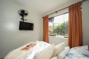 Cama ou camas em um quarto em Imperial Inn Hospedaje Turistico