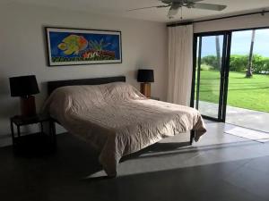 Ένα ή περισσότερα κρεβάτια σε δωμάτιο στο M San Rem Villa