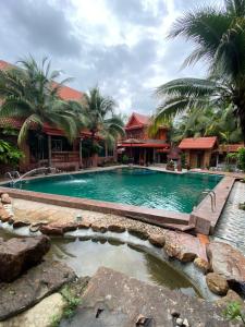 Bazén v ubytování Denen Resort&minizoo nebo v jeho okolí