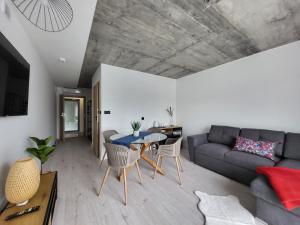 Posezení v ubytování USTROŃ RESIDENCE by VillaOlimpijska2
