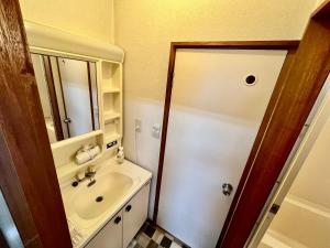 Koupelna v ubytování Apartment Hotel 下野