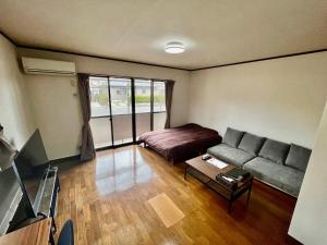 Posezení v ubytování Apartment Hotel 下野