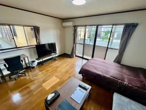 Posezení v ubytování Apartment Hotel 下野