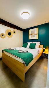 Ένα ή περισσότερα κρεβάτια σε δωμάτιο στο Appartement Cosy à Guilliers