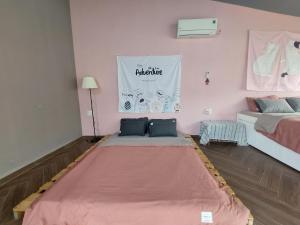 Postel nebo postele na pokoji v ubytování JS-Home