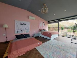 Postel nebo postele na pokoji v ubytování JS-Home