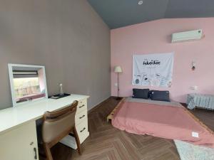 Postel nebo postele na pokoji v ubytování JS-Home