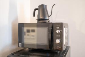 Sadržaji za pripremu kafe i čaja u objektu Apartment Hotel 11 Shinsaibashi