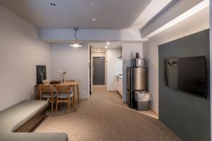 Kuhinja ili čajna kuhinja u objektu Apartment Hotel 11 Shinsaibashi
