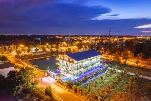 an aerial view of a building at night at Hestia HaMy Beach House in Hoi An