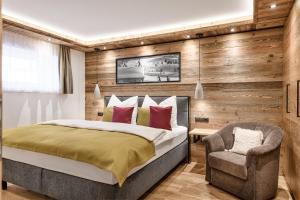 Łóżko lub łóżka w pokoju w obiekcie Apartment NH96 inklusive kostenfreiem Eintritt in die Alpentherme