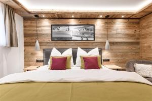 Łóżko lub łóżka w pokoju w obiekcie Apartment NH96 inklusive kostenfreiem Eintritt in die Alpentherme