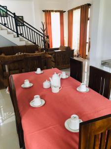 Posezení v ubytování Sri White Villa Airport Boutique Hotel