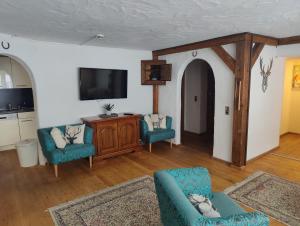 Μια τηλεόραση ή/και κέντρο ψυχαγωγίας στο Appartement Schönpflug