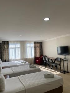 A bed or beds in a room at Hotel Real Life Még 37 kép