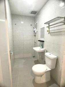 Koupelna v ubytování Garden Inns Motel