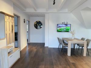 TV a/nebo společenská místnost v ubytování Apartment in Hofweier DG