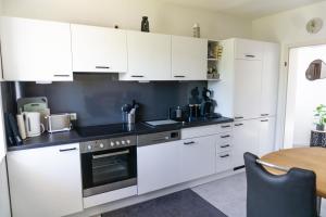 Kuchyň nebo kuchyňský kout v ubytování Ferienwohnung Leni + 16 fotografií