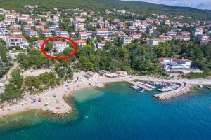 an aerial view of a beach with a red circle at Amarie in Dramalj +18 photos