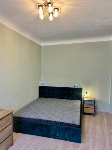 Postel nebo postele na pokoji v ubytování Primo Hotel