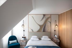 Llit o llits en una habitació de Storchen Zürich - Lifestyle Boutique Hotel