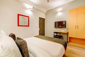 TV a/nebo společenská místnost v ubytování Hotel O Star Key