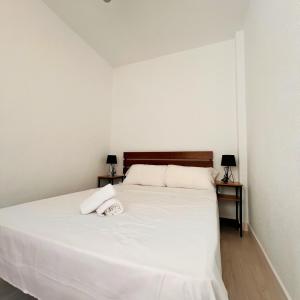 Ένα ή περισσότερα κρεβάτια σε δωμάτιο στο Casa Espejo by SunshineClub