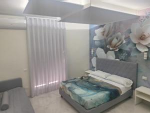 Postel nebo postele na pokoji v ubytování La Violetta