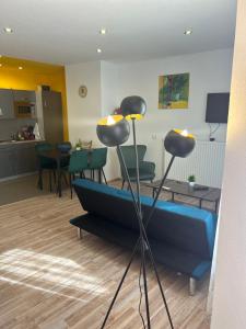 O zonă de relaxare la Piano Apartment Halle - Netflix - Free WiFi 4