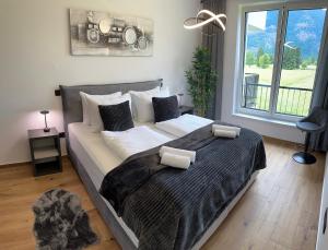 Postel nebo postele na pokoji v ubytování Riverstone Retreat Bovec