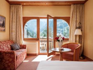 Postel nebo postele na pokoji v ubytování Relais & Chateaux Schönegg