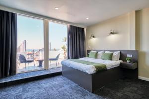 Postel nebo postele na pokoji v ubytování Duck Otel