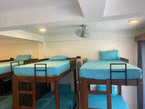 Ένα ή περισσότερα κρεβάτια σε δωμάτιο στο Trinco Beach Resort
