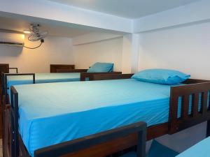 Ένα ή περισσότερα κρεβάτια σε δωμάτιο στο Trinco Beach Resort