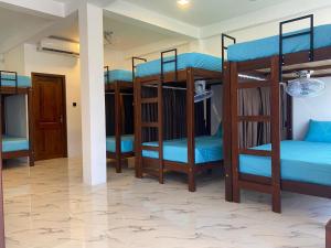 Ένα ή περισσότερα κρεβάτια σε δωμάτιο στο Trinco Beach Resort