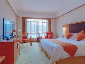 Postel nebo postele na pokoji v ubytování Pullman Zhangjiajie Hotel - Instagrammable
