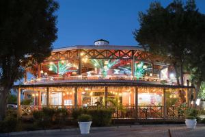 a building with lights on it at night at Port de Plaisance Resort, Trademark Collection by Wyndham in Philipsburg +51 photos
