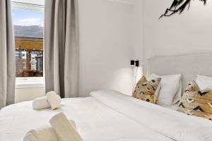 Postel nebo postele na pokoji v ubytování Pergola - Free parking - 5 min walk to facilities