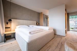 Posteľ alebo postele v izbe v ubytovaní Hotel Sonnenheim