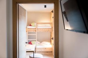 Posteľ alebo postele v izbe v ubytovaní Hotel Sonnenheim