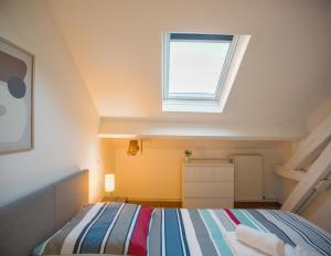 Ένα ή περισσότερα κρεβάτια σε δωμάτιο στο Duplex Pasteur - Chambre 1 - Chambre Privée