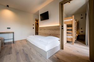 Posteľ alebo postele v izbe v ubytovaní Hotel Sonnenheim